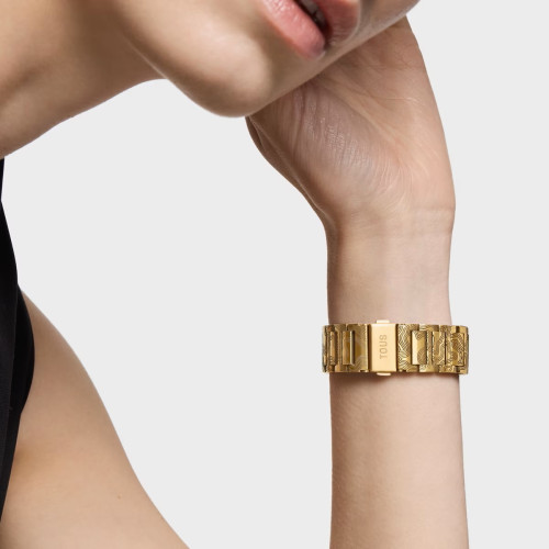 Reloj analógico con brazalete grabado de acero dorado Lit