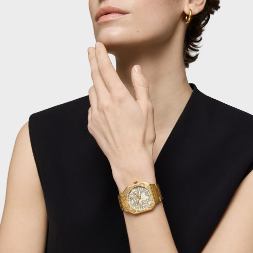 Reloj analógico con brazalete grabado de acero dorado Lit